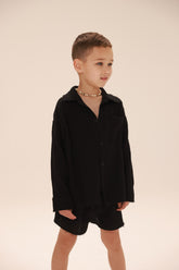 חליפת טראוויס שחורה