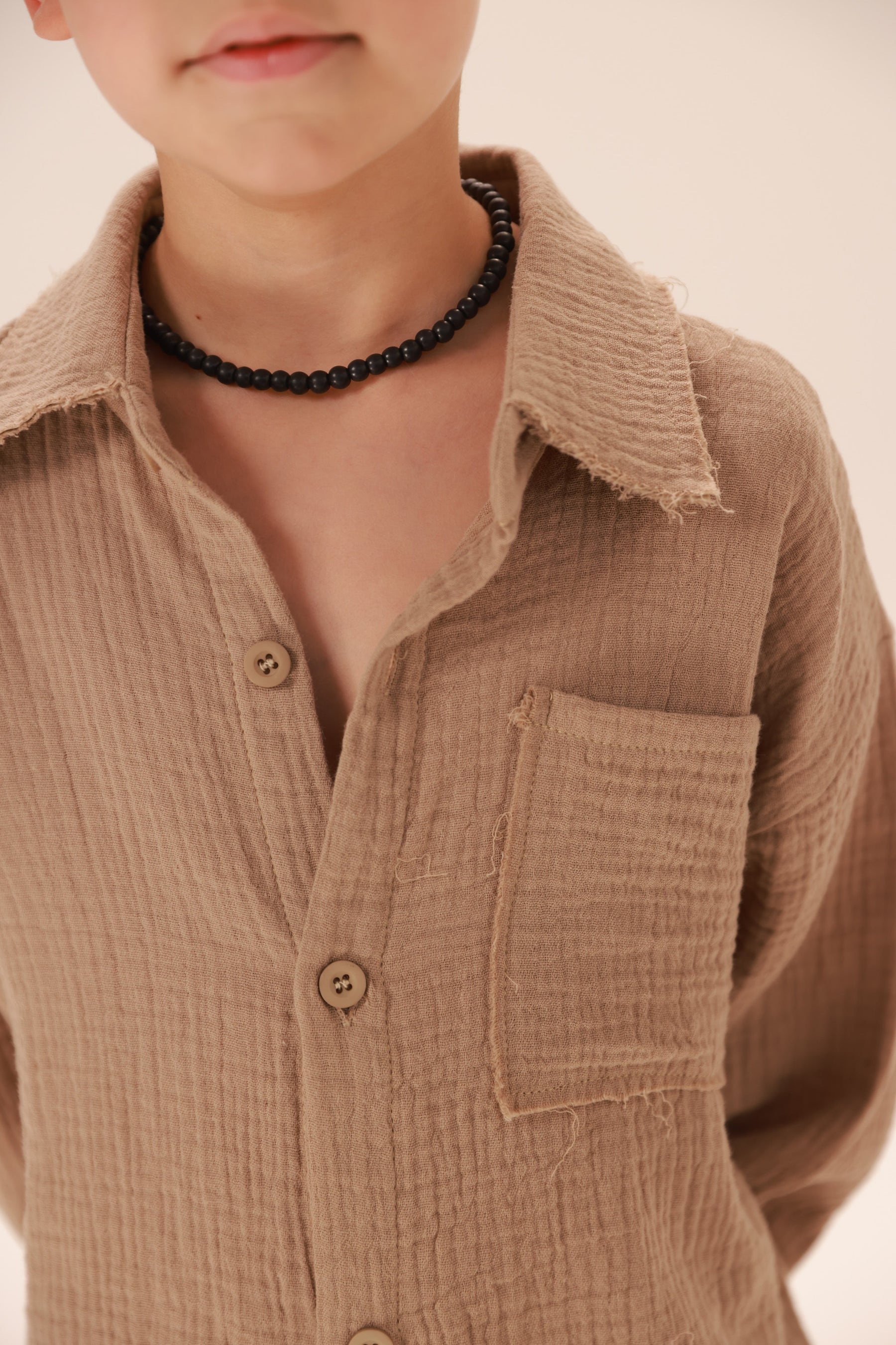 חליפת טראוויס חאקי