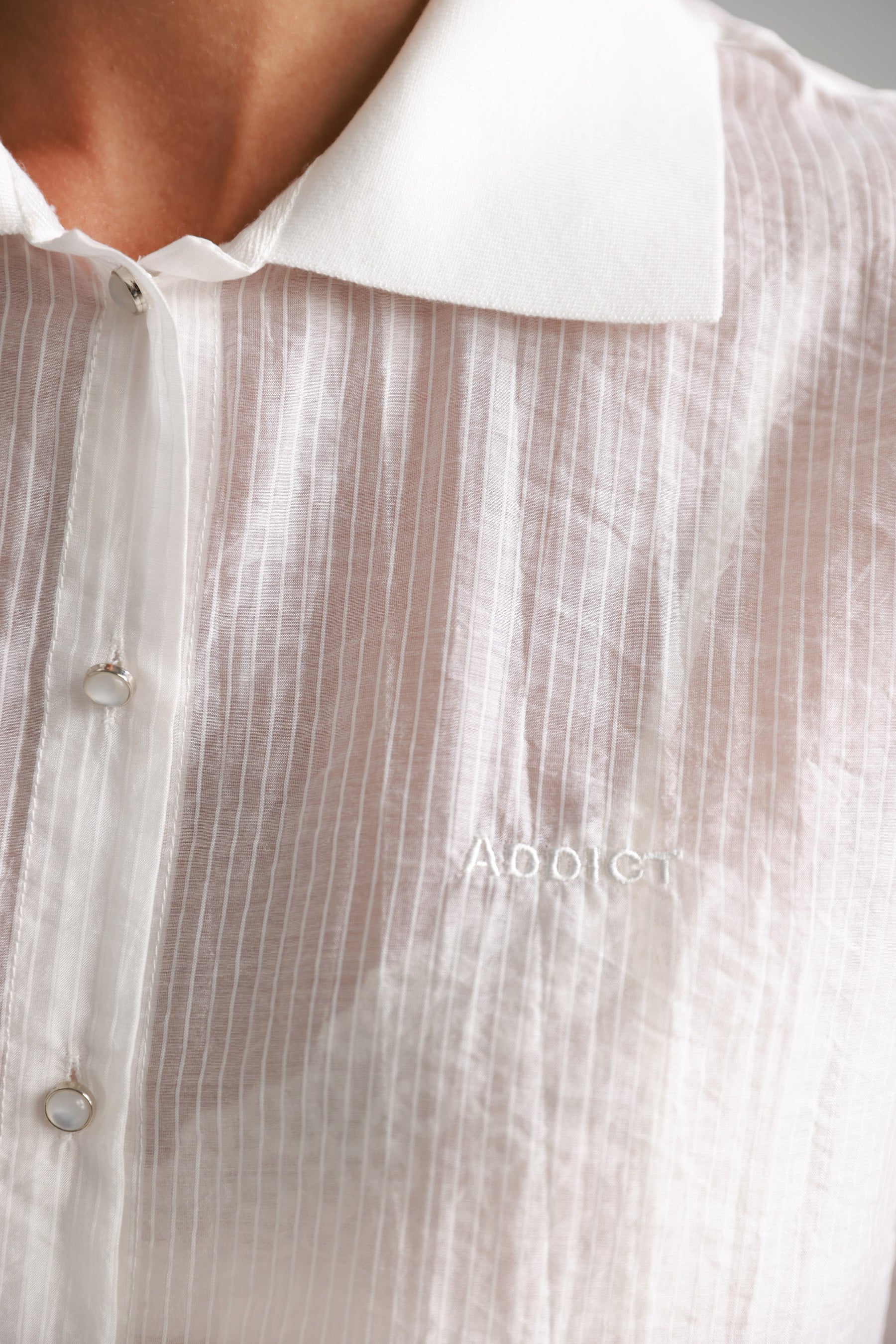 חולצת רוס מכופתרת לבנה