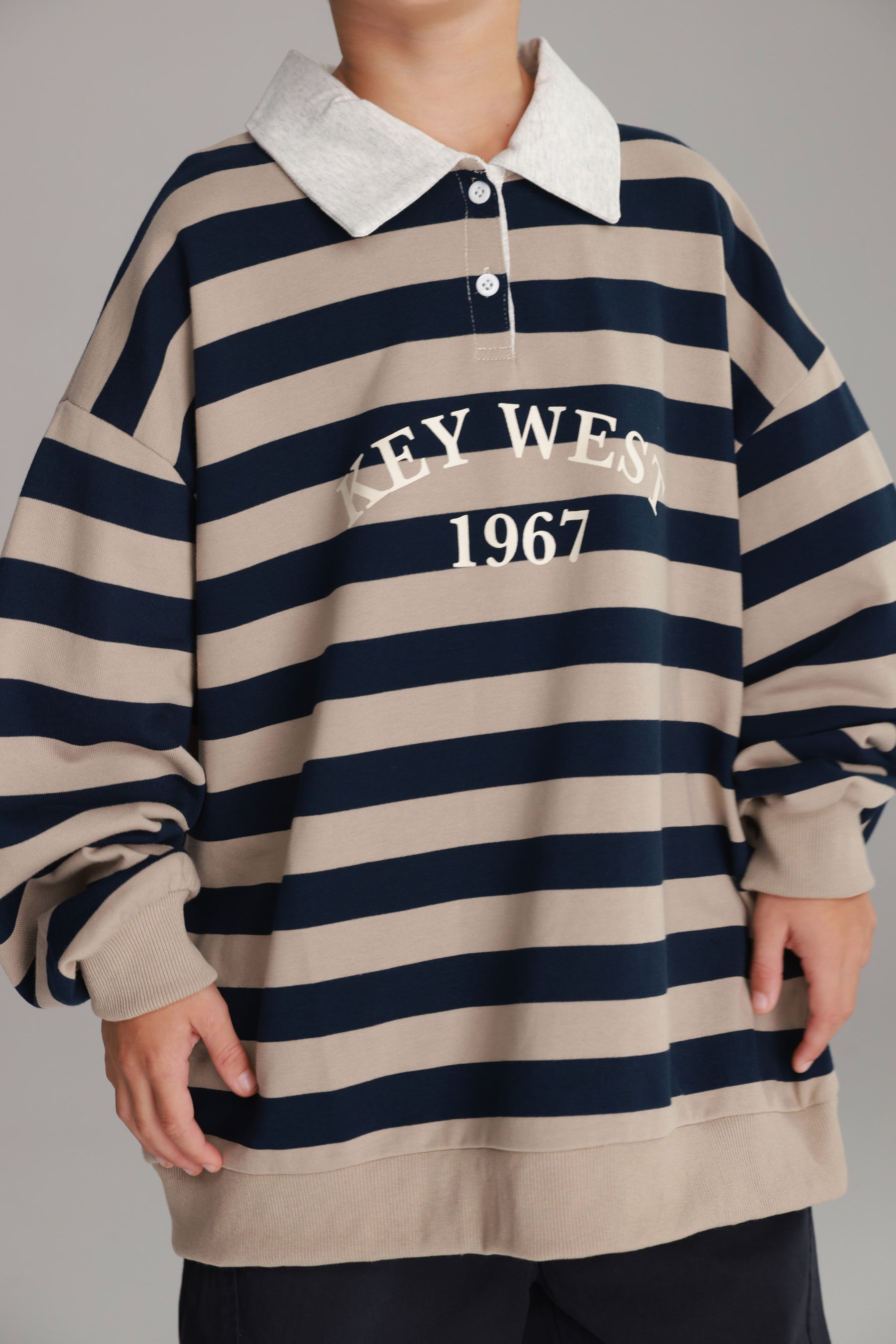 סוויטשירט קוני פסים בז'/נייבי