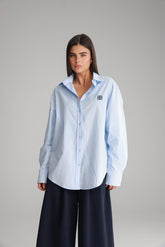 חולצת תיאו מכופתרת תכלת