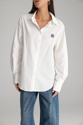 חולצת תיאו מכופתרת לבנה