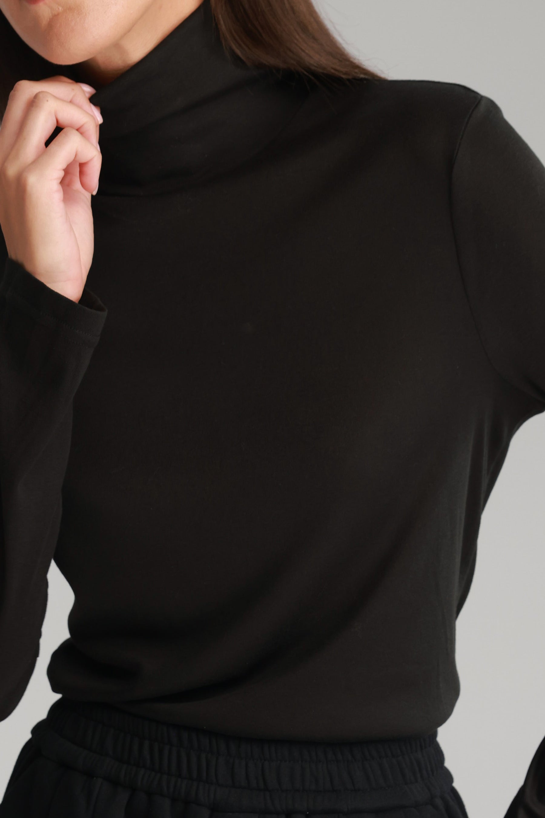 חולצת גולף בריאנה שחורה