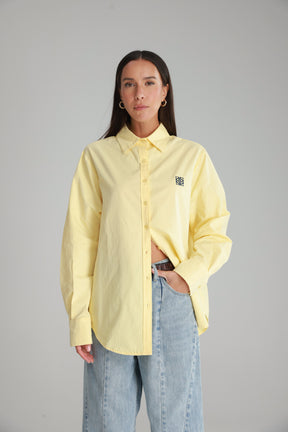 חולצת תיאו מכופתרת צהובה