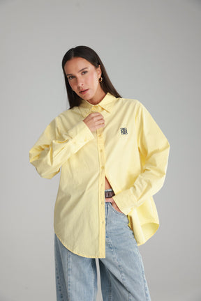 חולצת תיאו מכופתרת צהובה