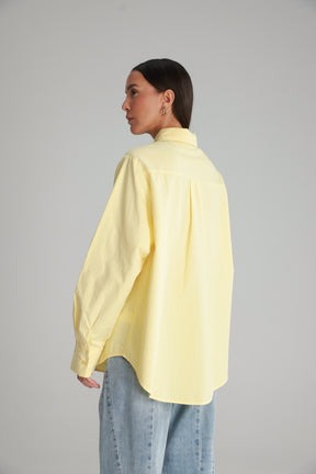 חולצת תיאו מכופתרת צהובה