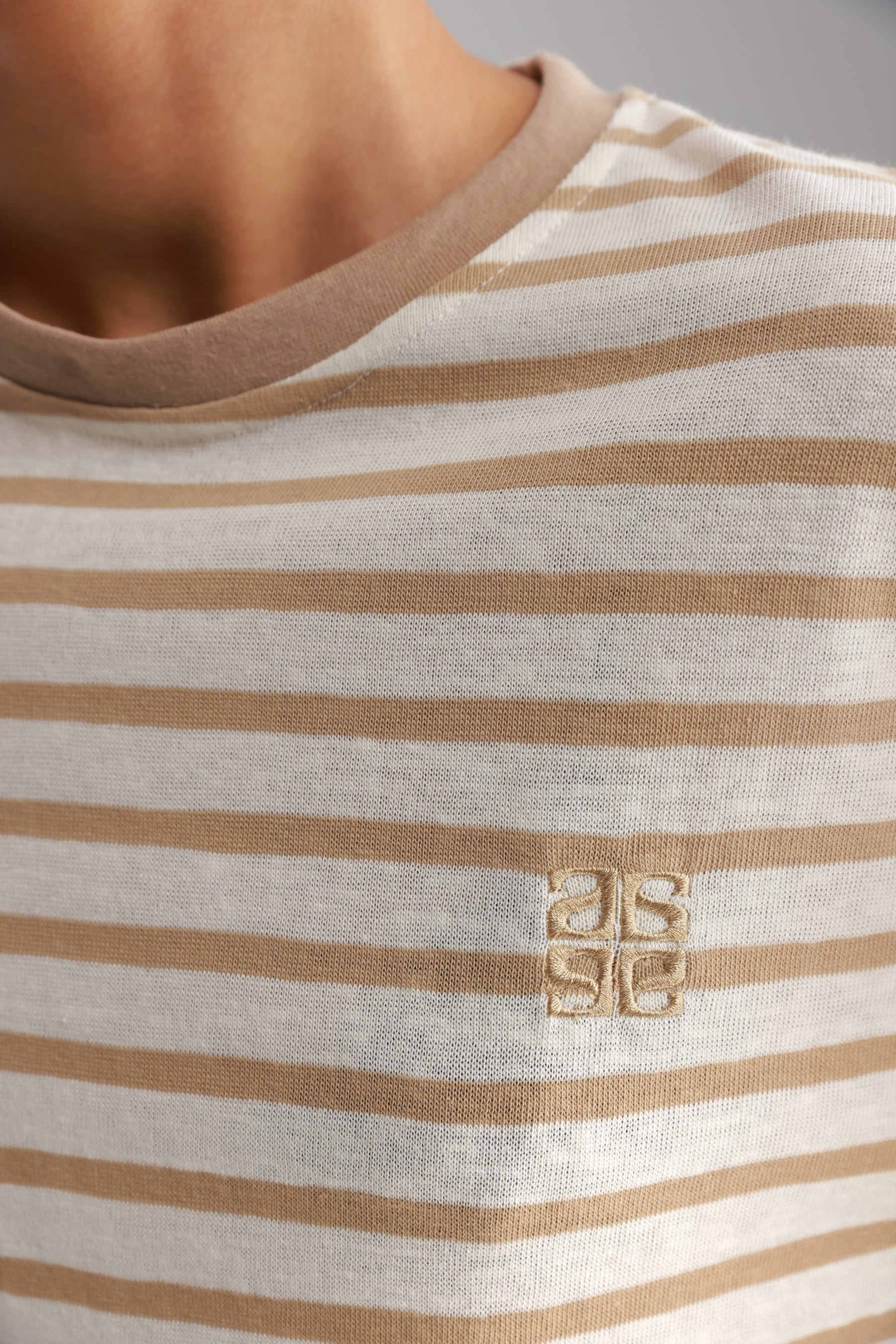 חולצת לוסי פסים שמנת/בז׳