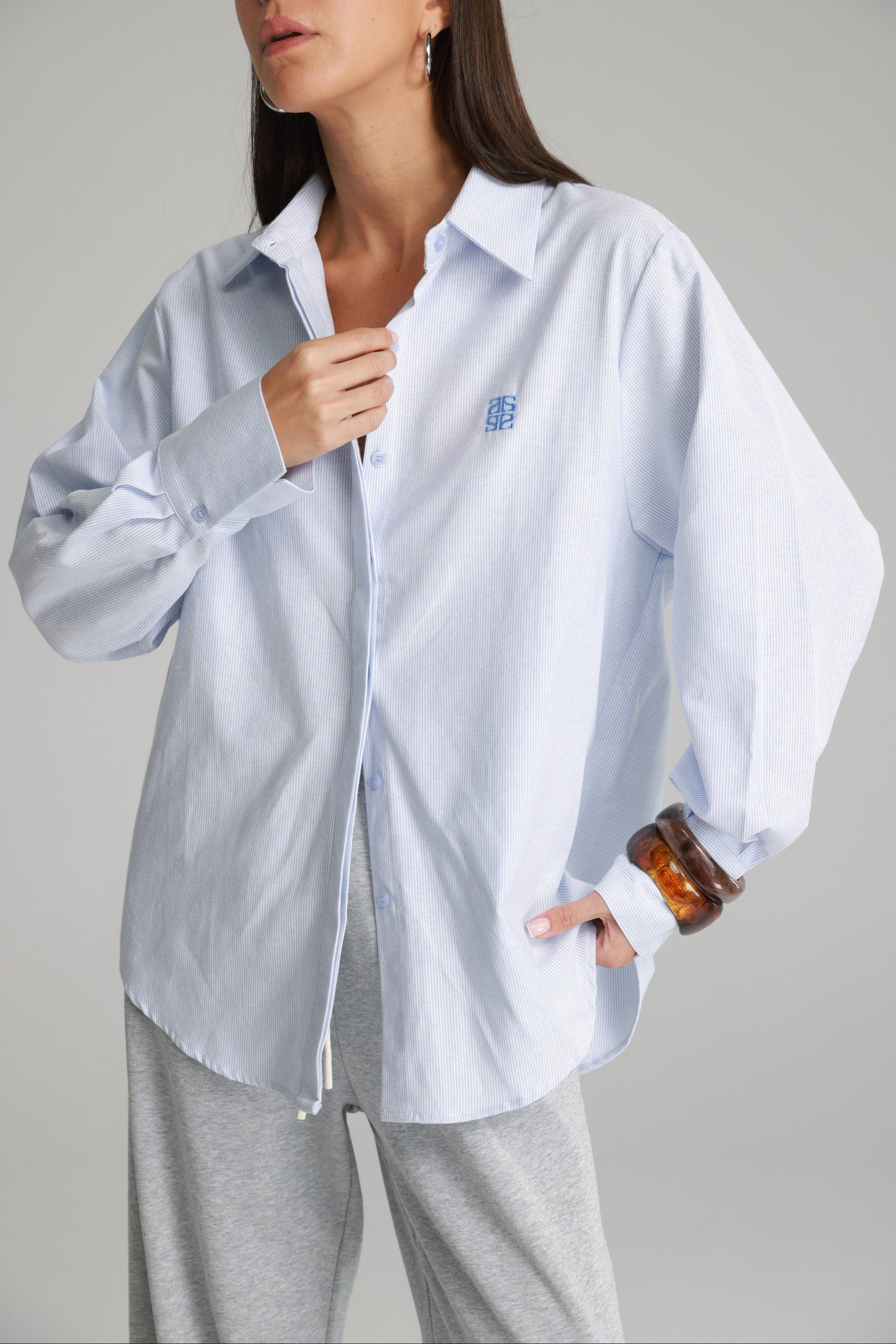 חולצת קיילי מכופתרת תכלת