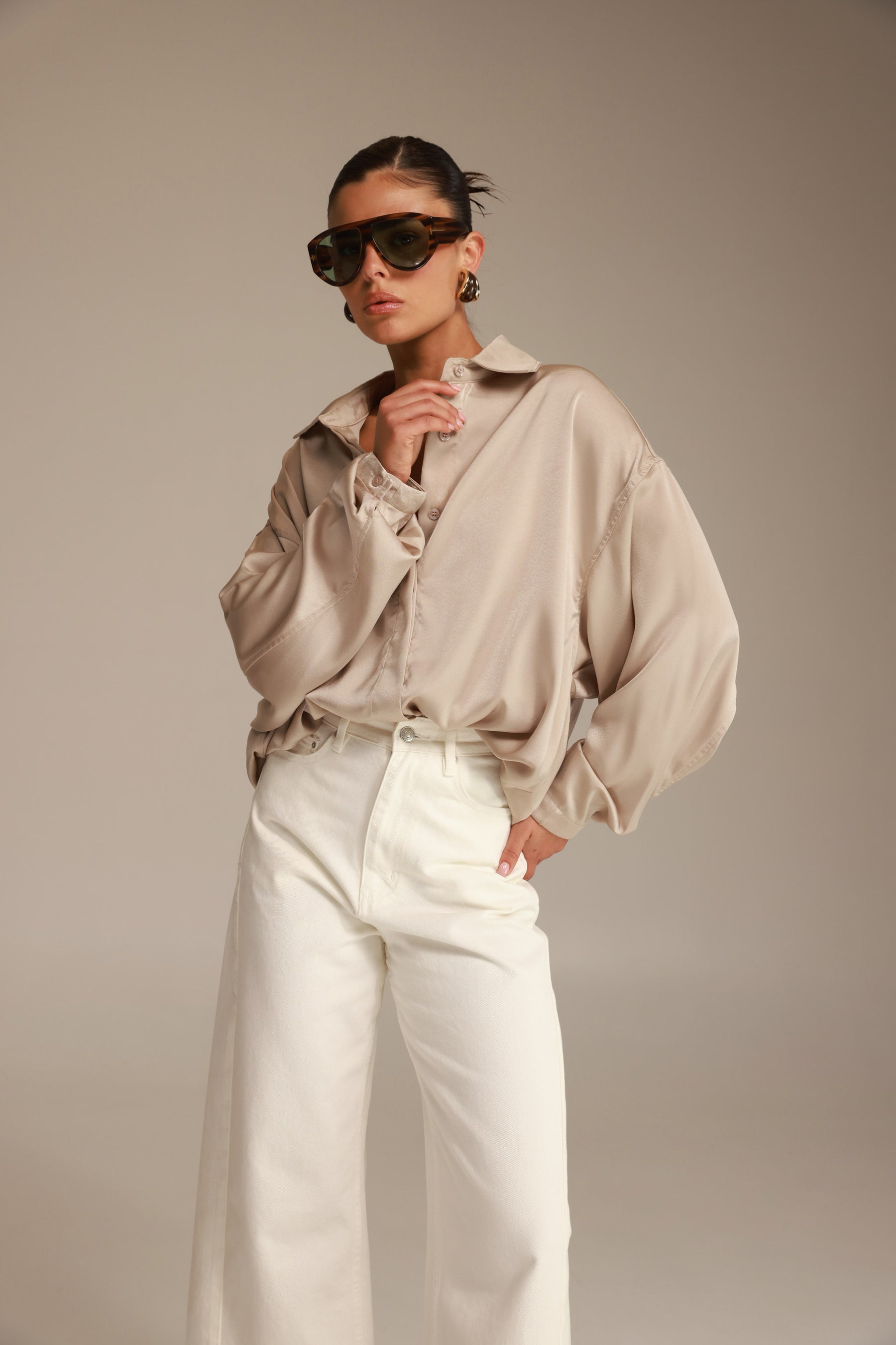 חולצת פיה מכופתרת שמפניה