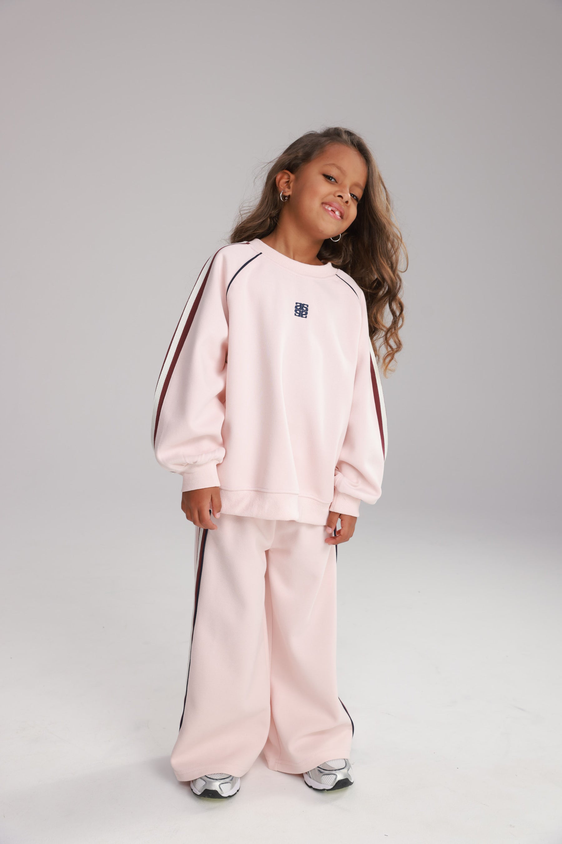 חליפת סרינה ורודה