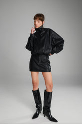 חצאית מיני ג'וליה דמוי עור שחורה