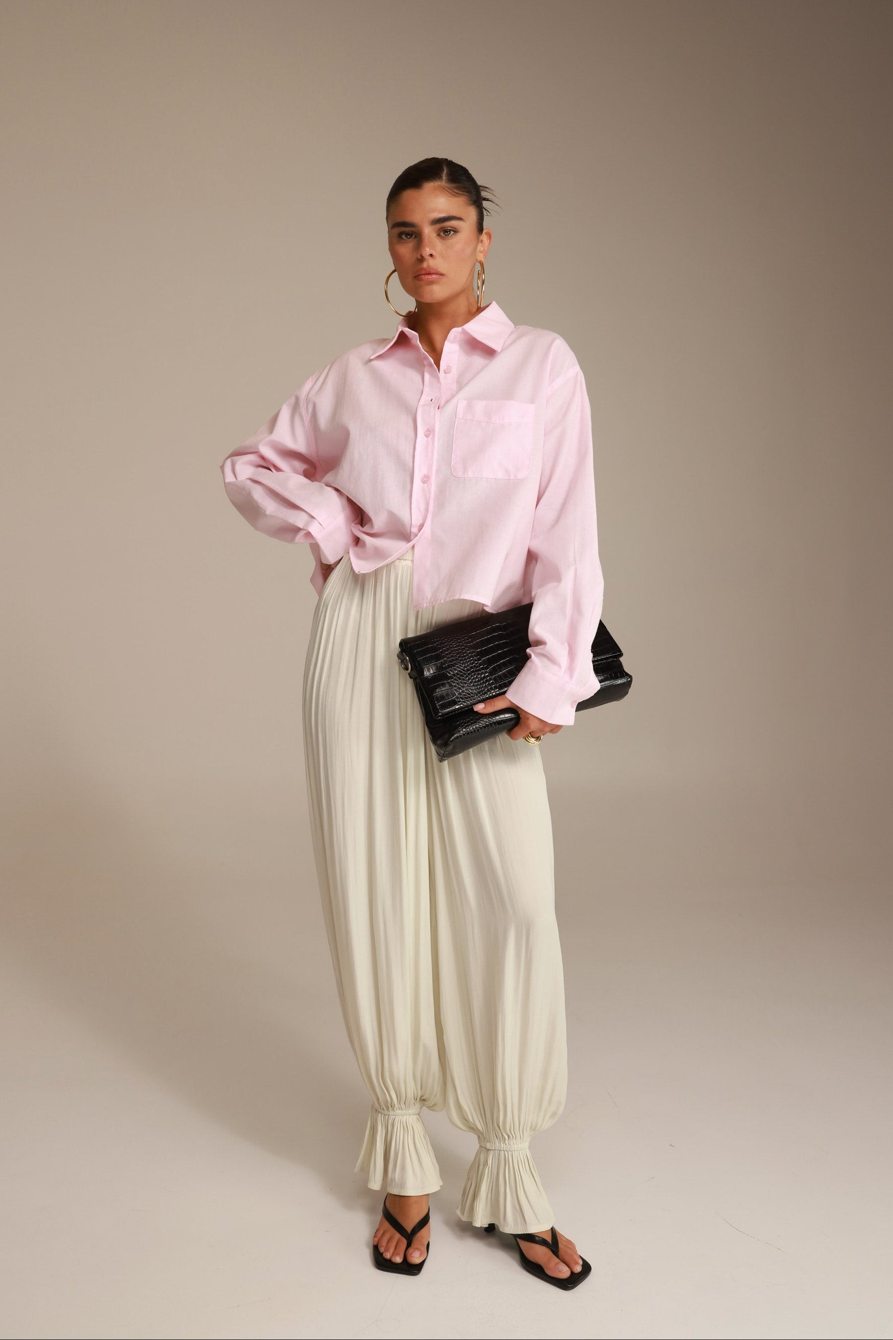 חולצת סילבר מכופתרת ורודה