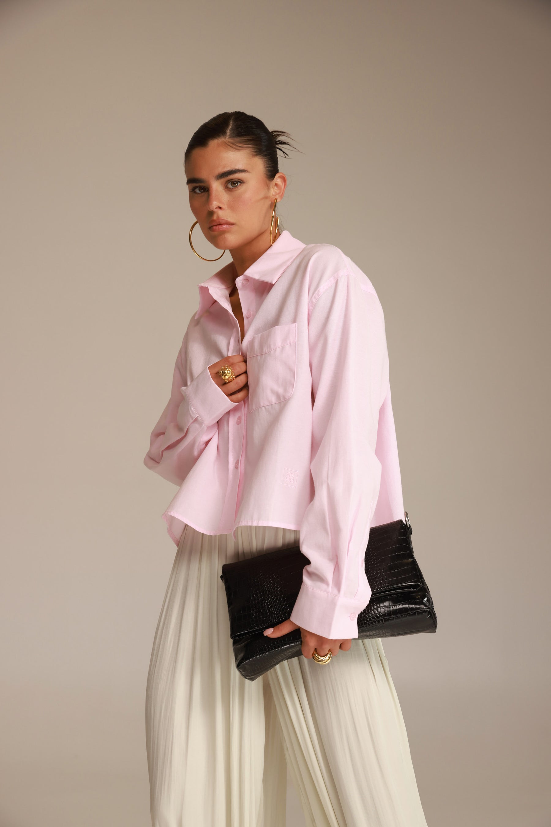 חולצת סילבר מכופתרת ורודה