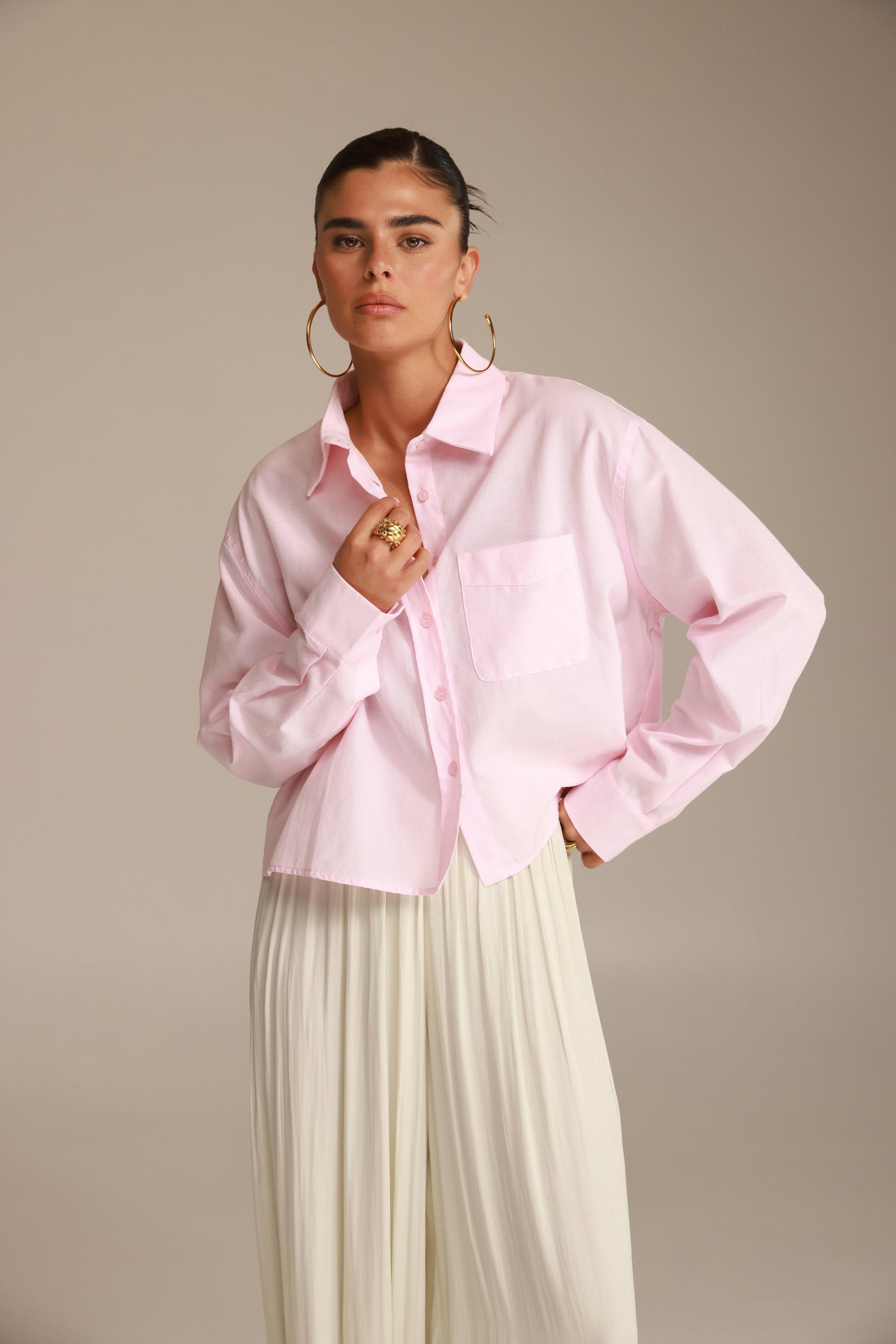 חולצת סילבר מכופתרת ורודה