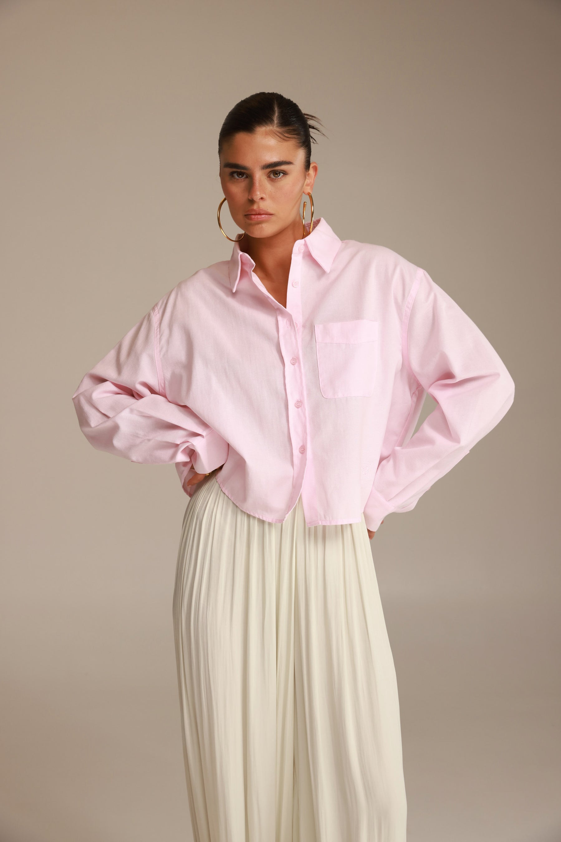 חולצת סילבר מכופתרת ורודה