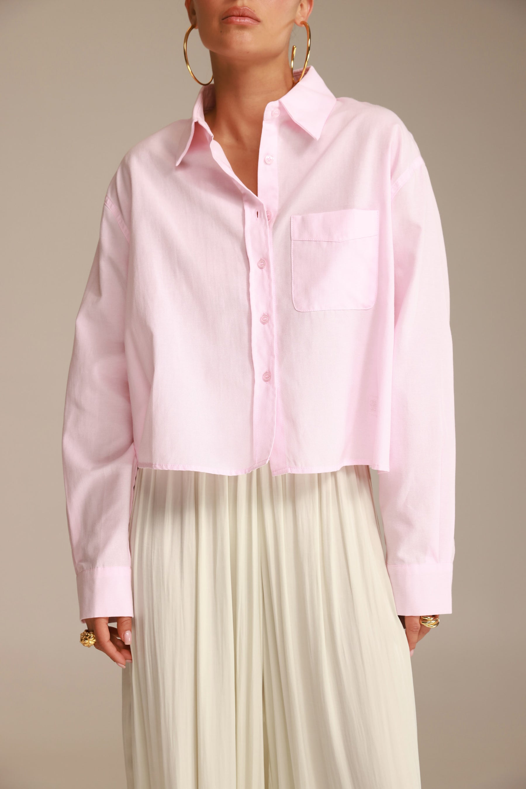 חולצת סילבר מכופתרת ורודה