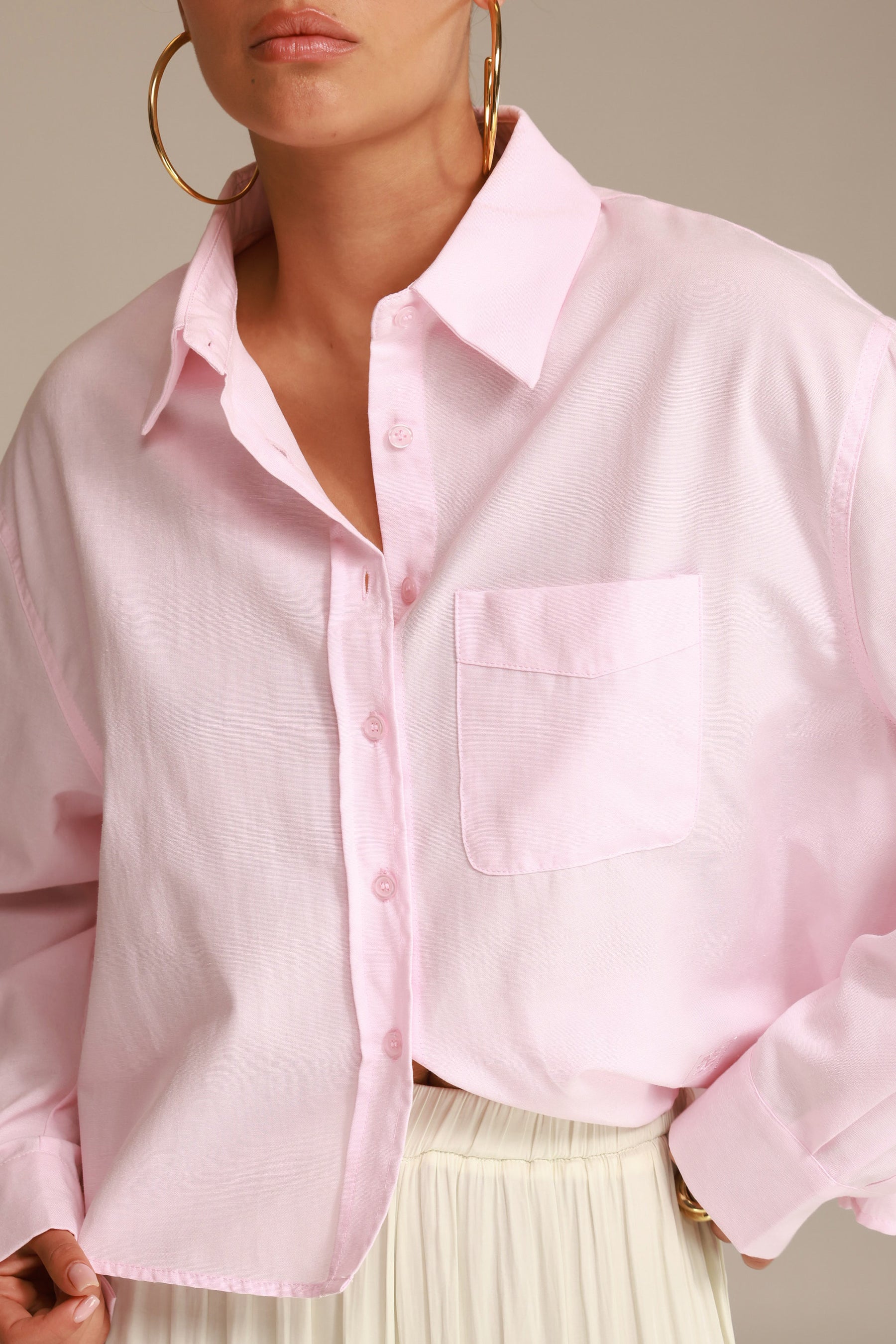 חולצת סילבר מכופתרת ורודה