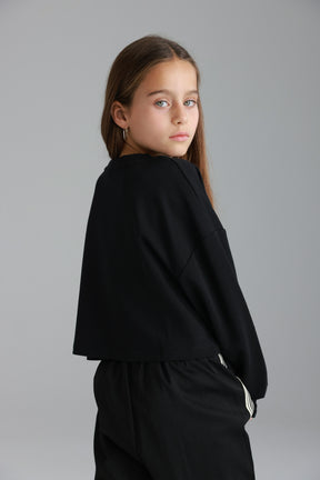 חולצת אינה שחורה