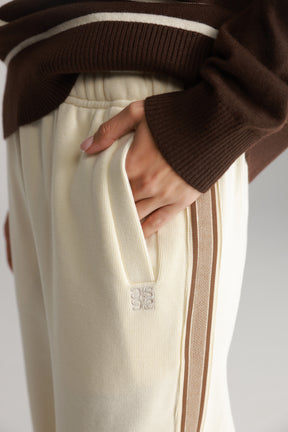 מכנסי ג'ולי שמנת