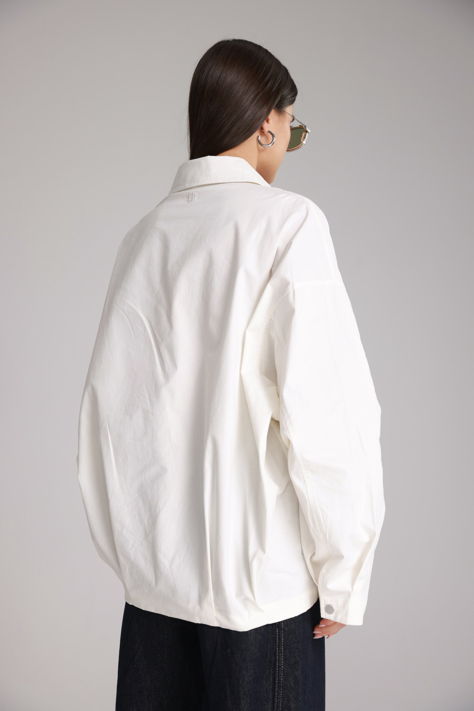 חולצת ארי מכופתרת לבנה