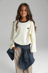 חולצת פייל שמנת