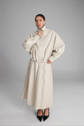 חצאית מידי ג'וליה דמוי עור שמנת