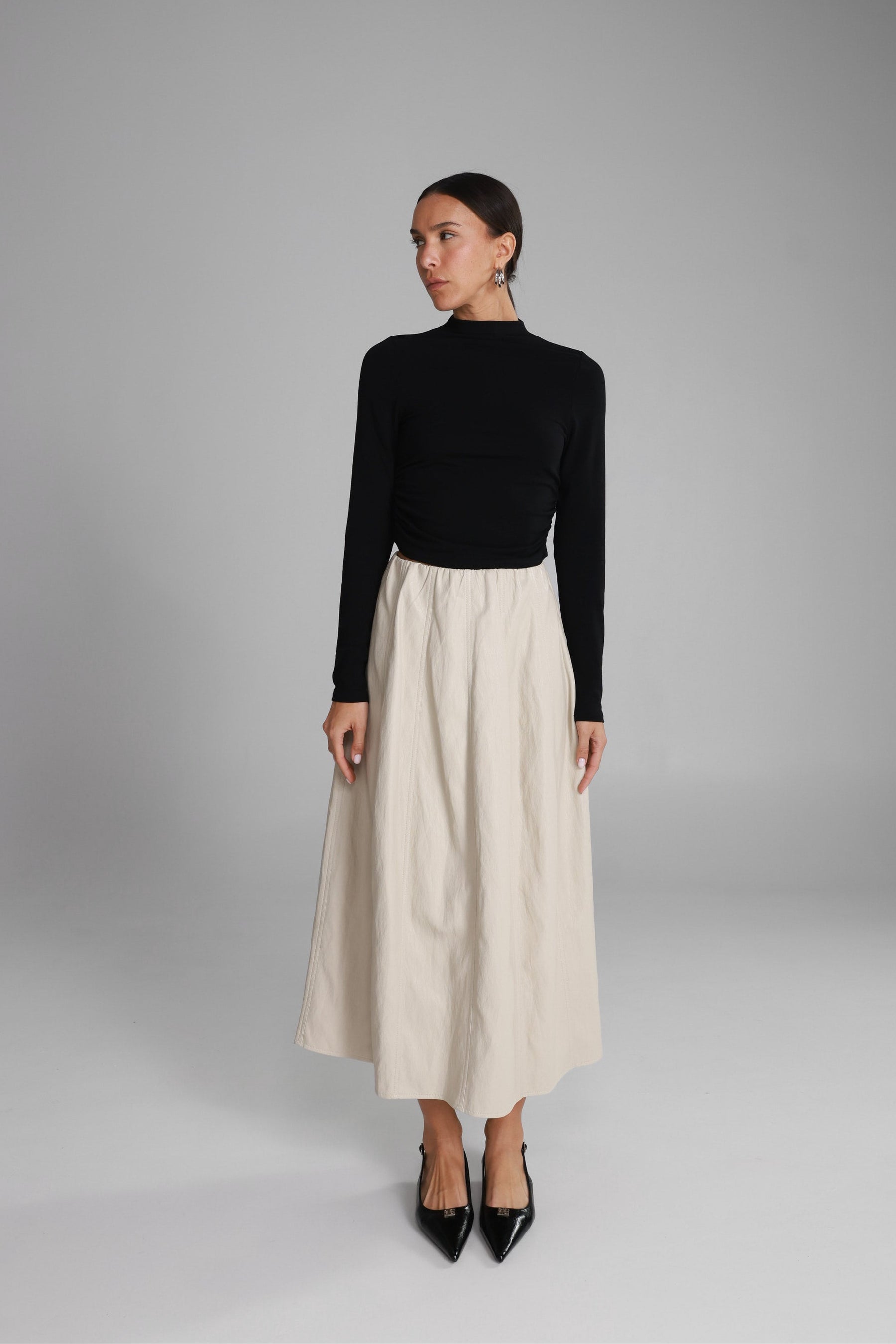 חצאית מידי ג'וליה דמוי עור שמנת