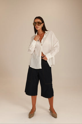 חולצת מיילו מכופתרת לבנה