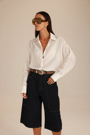 חולצת מיילו מכופתרת לבנה