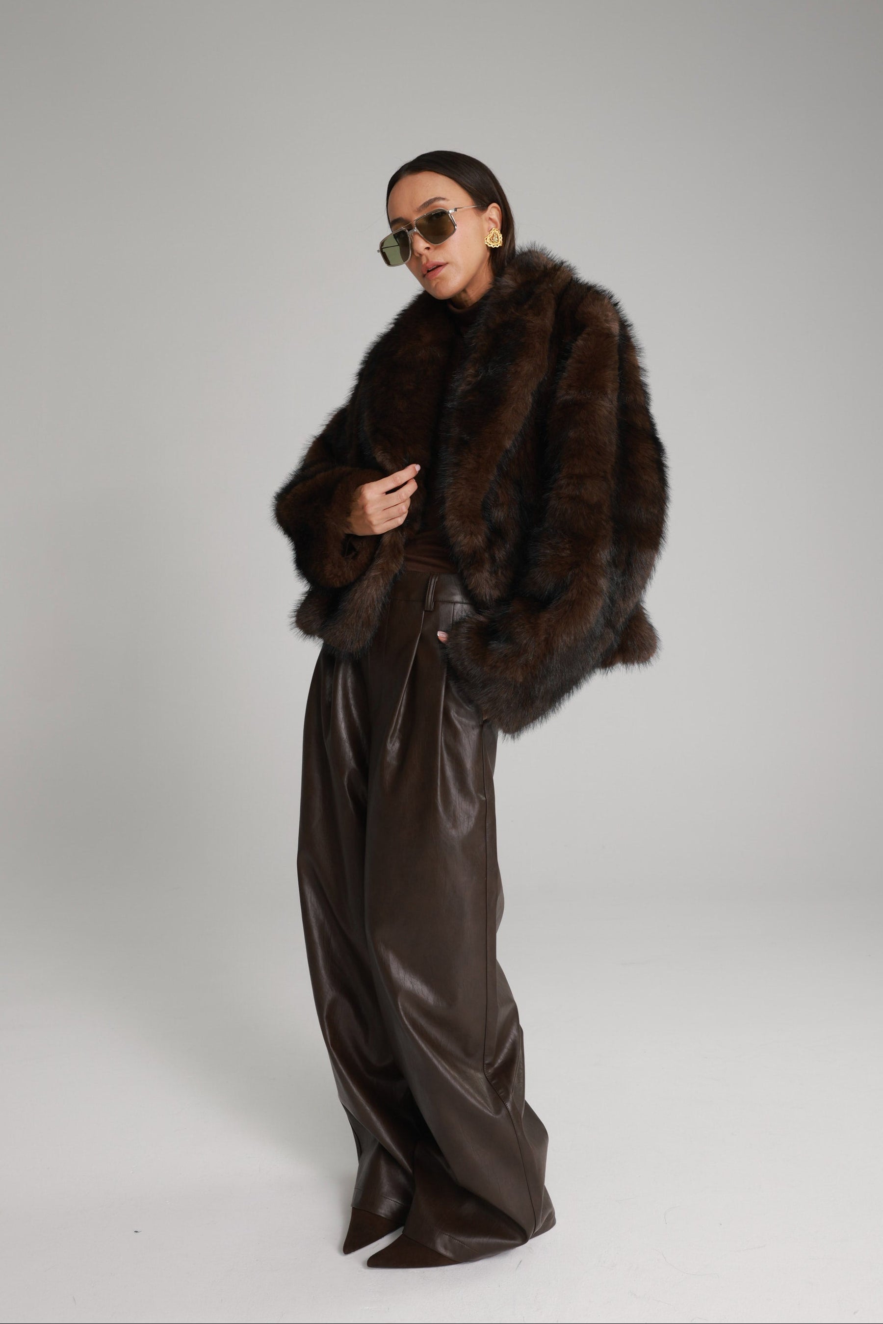 מכנסי נואלה דמוי עור חום כהה