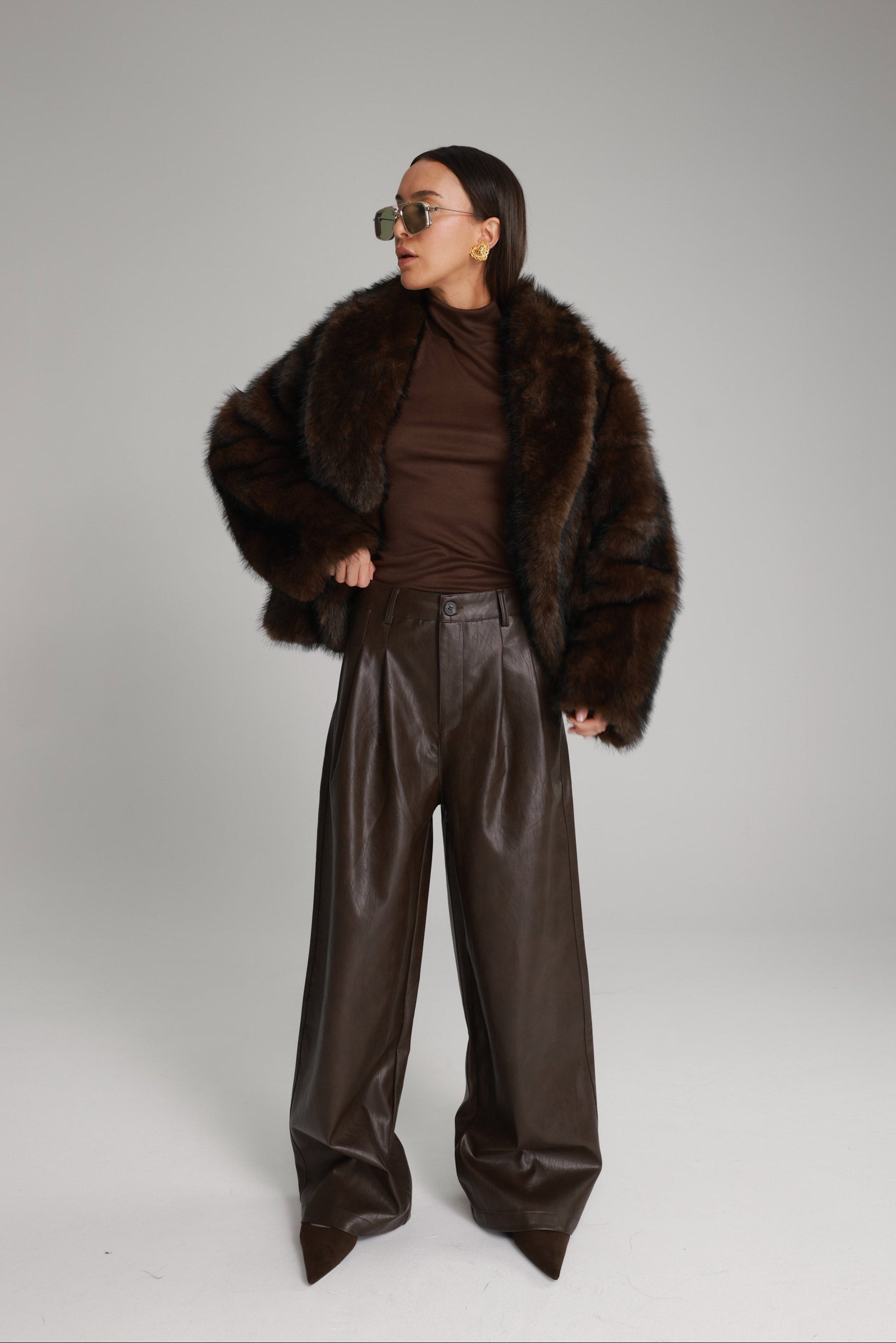 מכנסי נואלה דמוי עור חום כהה