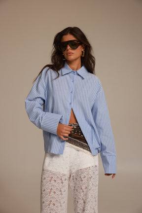 חולצת אוריאן מכופתרת תכלת