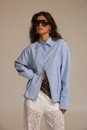 חולצת אוריאן מכופתרת תכלת