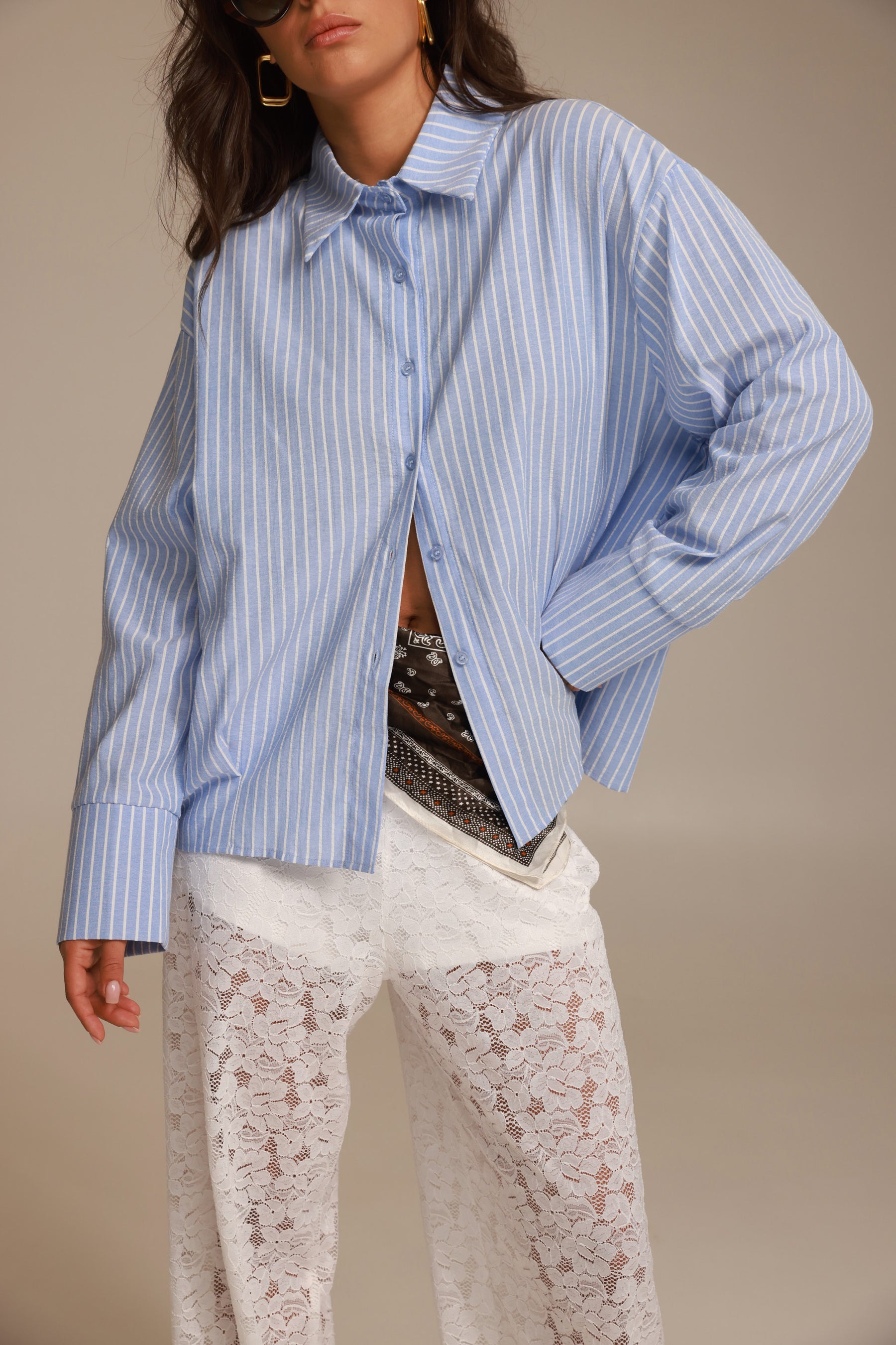 חולצת אוריאן מכופתרת תכלת