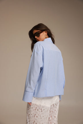 חולצת אוריאן מכופתרת תכלת