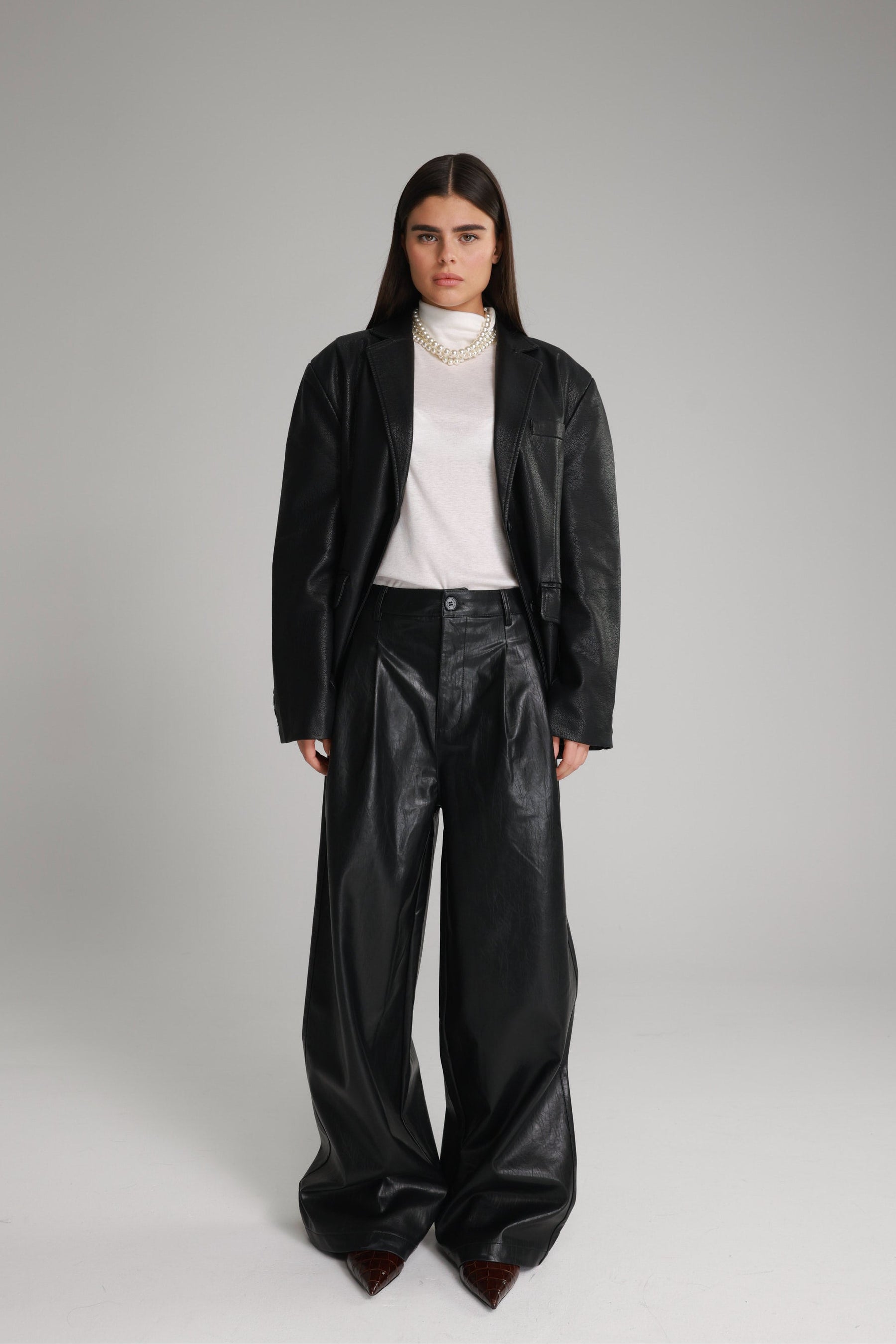 מכנסי נואלה דמוי עור שחורים