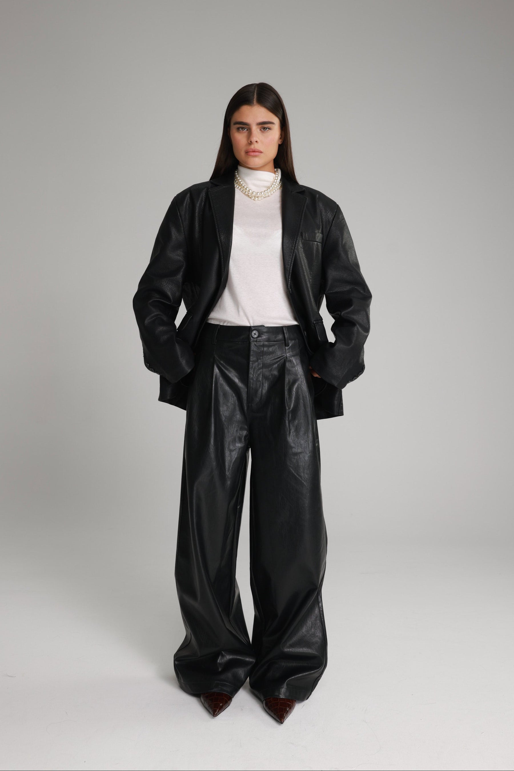 מכנסי נואלה דמוי עור שחורים