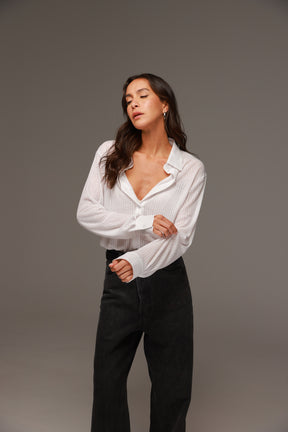 חולצת לוסי מכופתרת לבנה