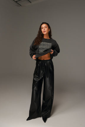 מכנסי טרוור דמוי עור שחורים