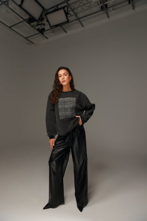 מכנסי טרוור דמוי עור שחורים