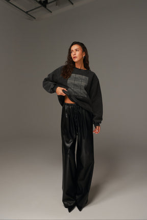 מכנסי טרוור דמוי עור שחורים