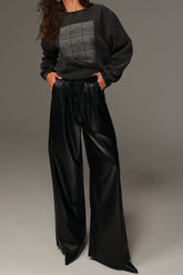 מכנסי טרוור דמוי עור שחורים