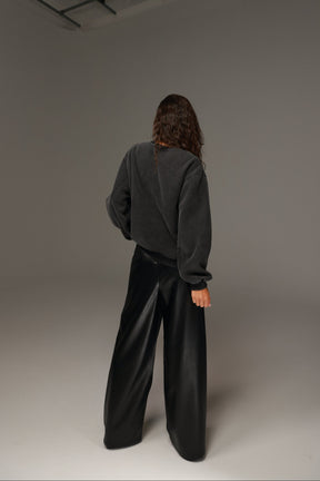 מכנסי טרוור דמוי עור שחורים